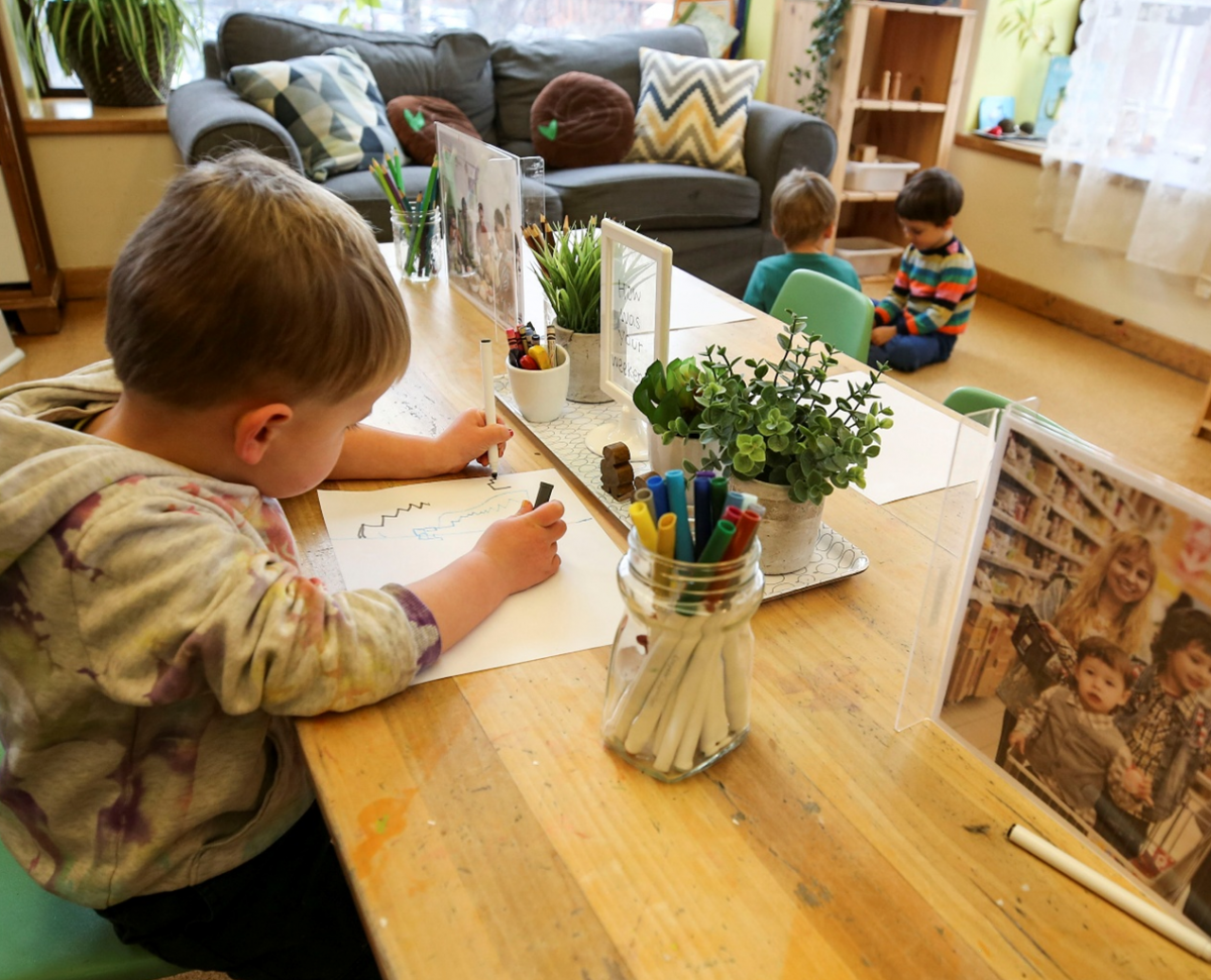 Co-workers reviewing a manual