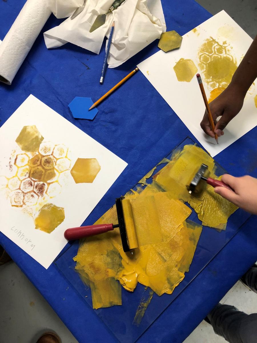 Printmaking by grade 5 students at Yarmouth Elementary School who participated in workshops exploring the concept of terroir using 3 themes: honeybees, coastal fish, and seaweed.